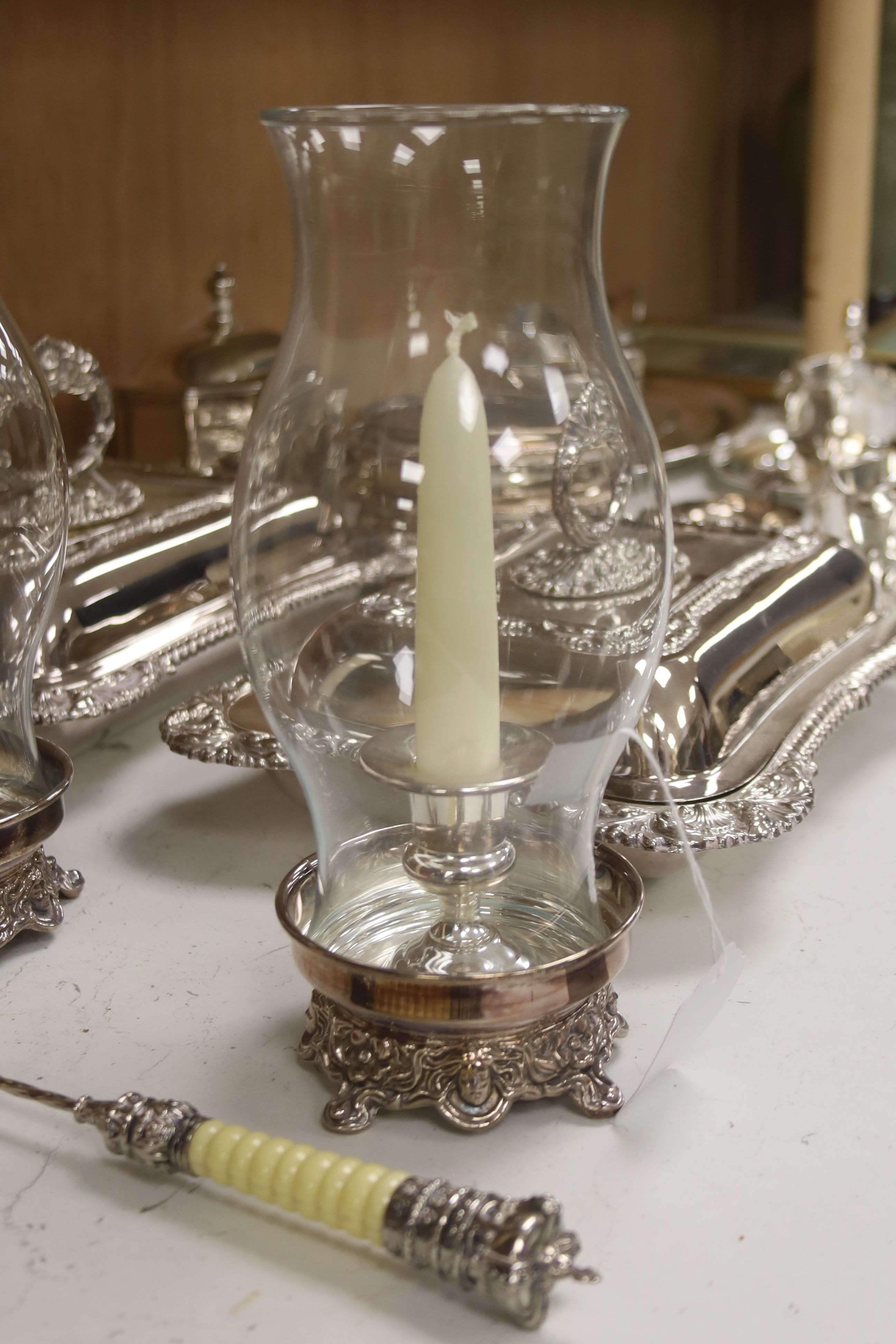 Various plated items, including a pair of rectangular entrée dishes and cover